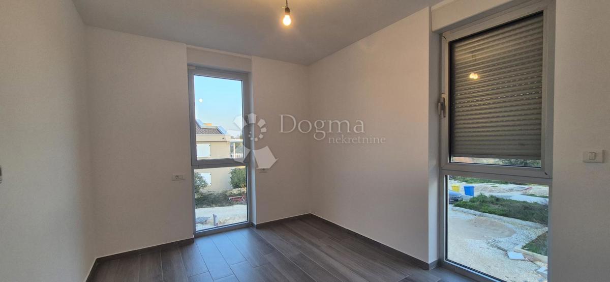 Dvosobno stanovanje v novogradnji 1 km od morja, površina 54,47 m2