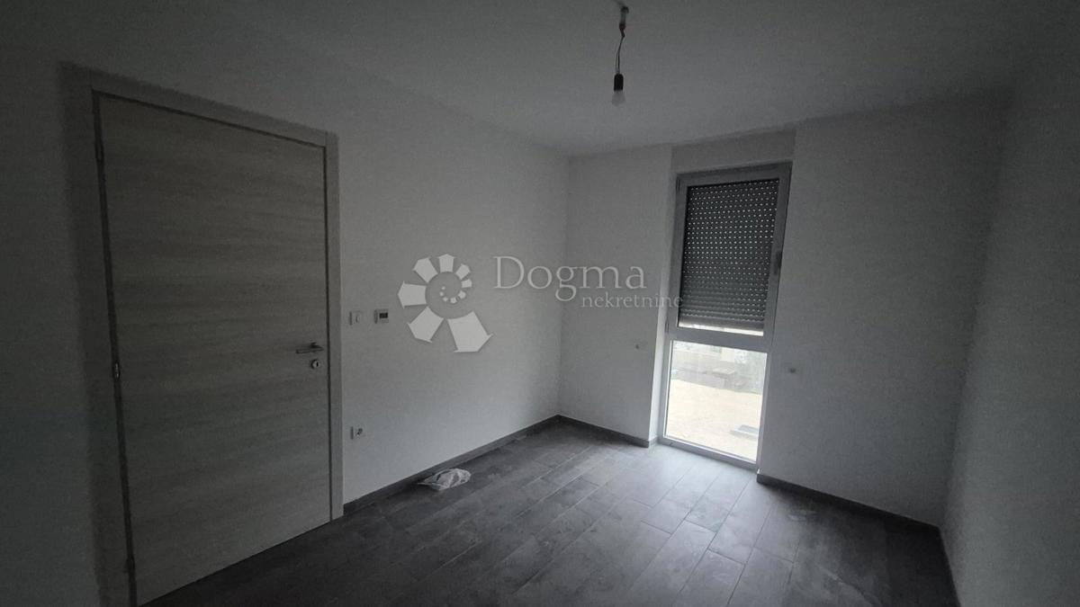 Dvosobno stanovanje v novogradnji 1 km od morja, površina 54,47 m2