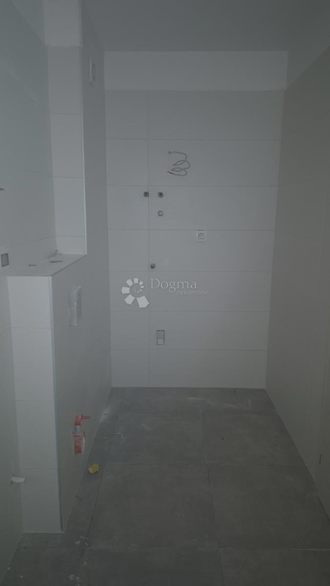 Dvosobno stanovanje v novogradnji 1 km od morja, površina 54,47 m2