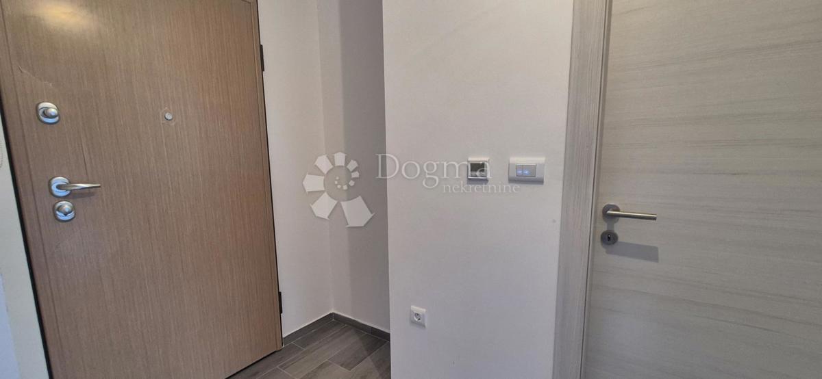 Dvosobno stanovanje v novogradnji 1 km od morja, površina 54,47 m2