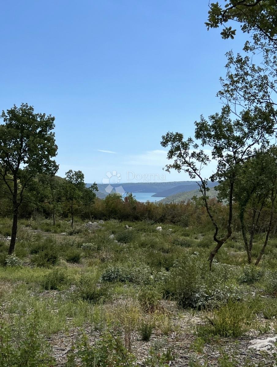 Zazidljivo zemljišče Kunj, Raša, 1.909m2