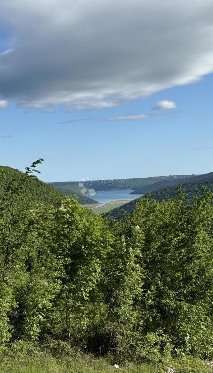 Zazidljivo zemljišče Kunj, Raša, 1.909m2