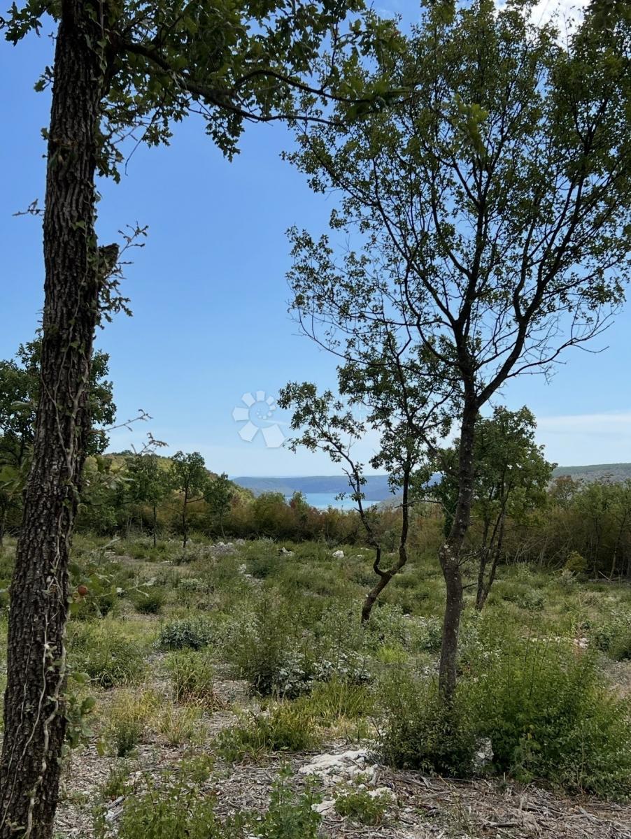 Zazidljivo zemljišče Kunj, Raša, 1.909m2