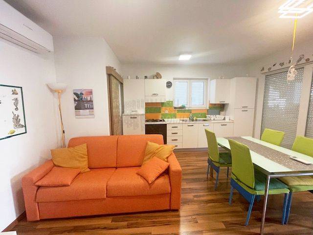 Apartma z zasebnim vrtom in skupnim bazenom!