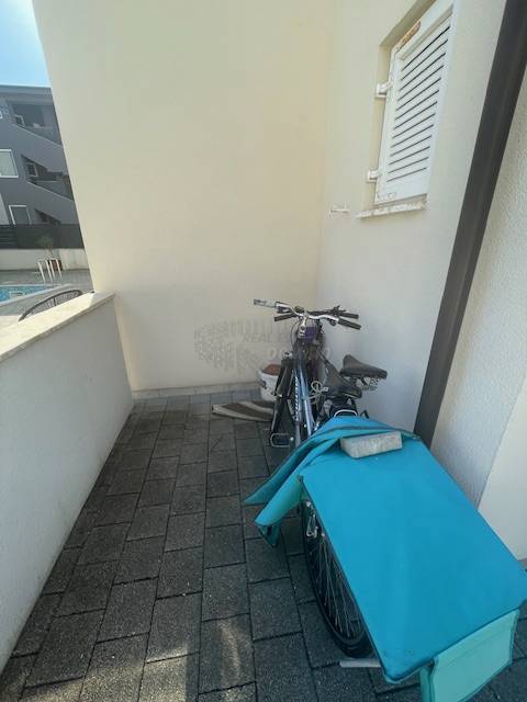 Apartma z zasebnim vrtom in skupnim bazenom!