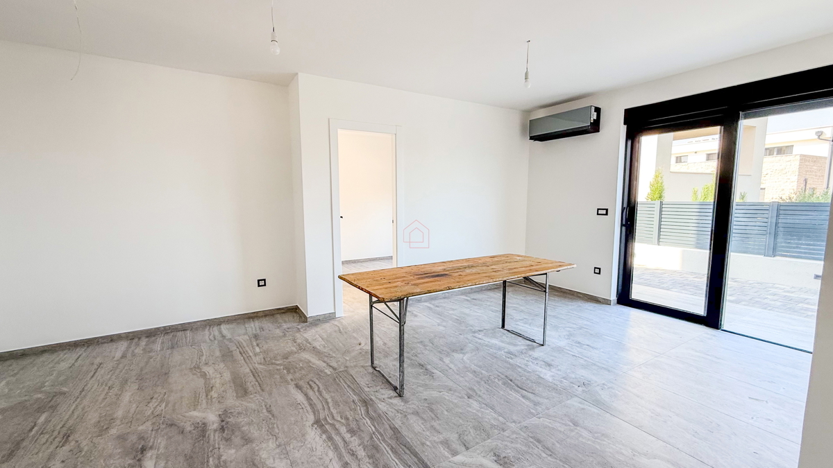 Novogradnja 2025 - stanovanje z dvema spalnicama in vrtom