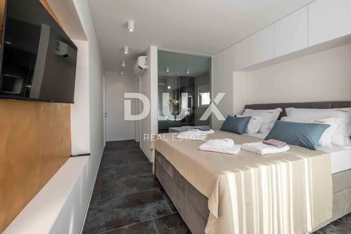 OTOK PAG, NOVALJA - Vila s 4 spalnicami, bazenom in savno, 148,50 m2