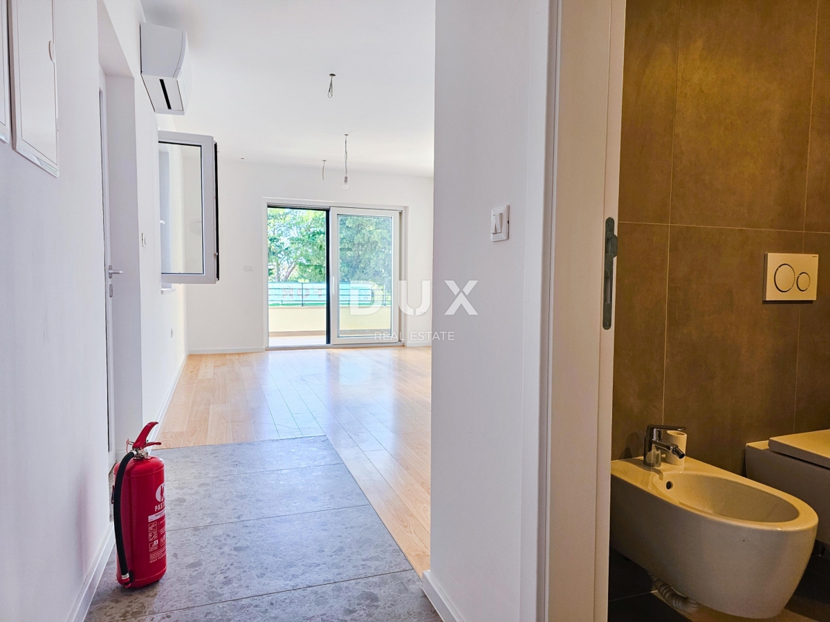 MALI LOŠINJ, CENTER - PRILOŽNOST - Stanovanje v pritličju z vrtom in parkiriščem