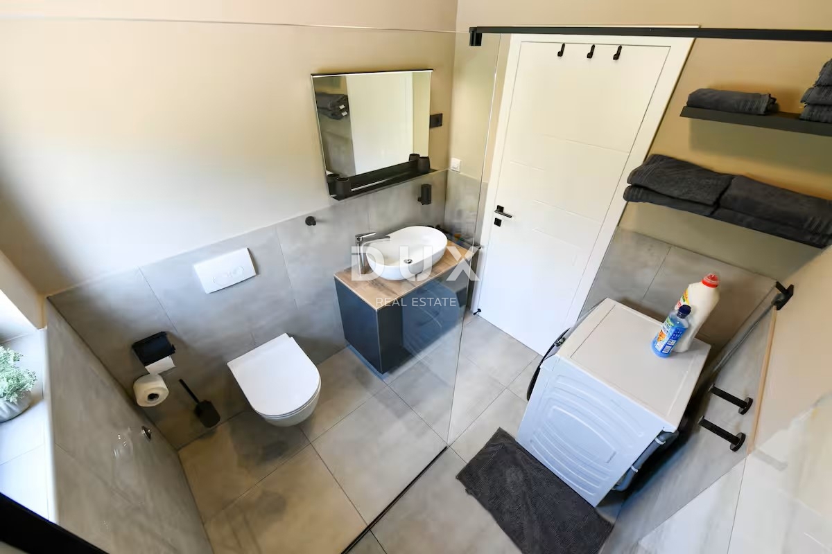 OPATIJA, OPRIĆ - stanovanje v novogradnji z vrtom in pogledom na morje