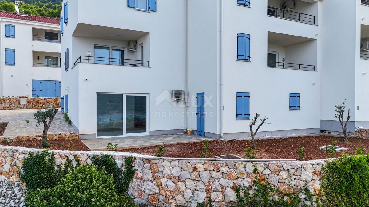 OTOK CRES, CRES - Apartma z vrtom, parkiriščem in pogledom na morje