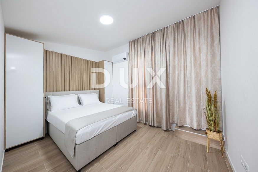 OTOK PAG, POVLJANA - Dvonadstropno stanovanje 83m2, 1. vrsta do morja