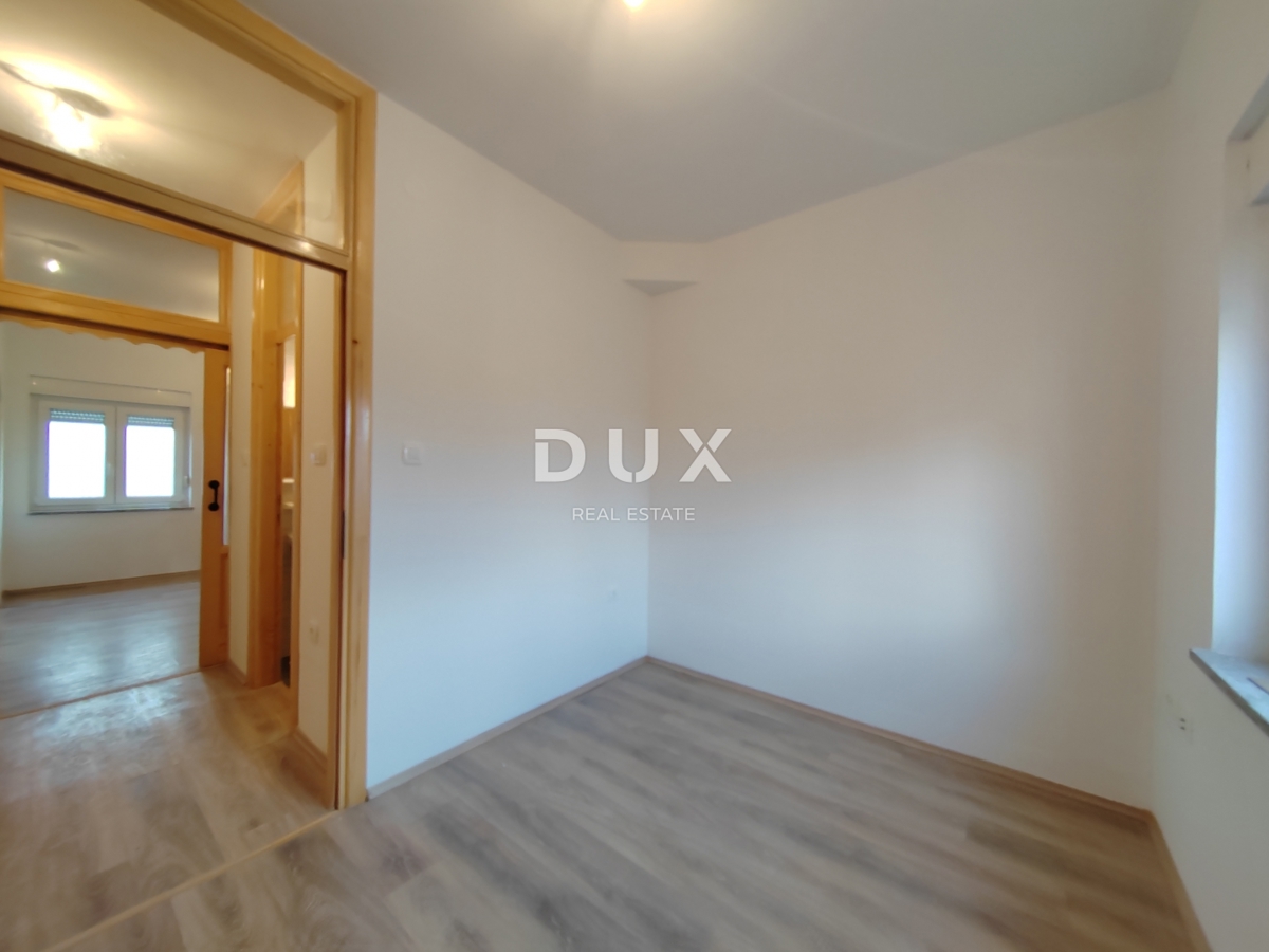 GOSPIĆ - Samostojna hiša s prostornim vrtom in obdelovalnim zemljiščem