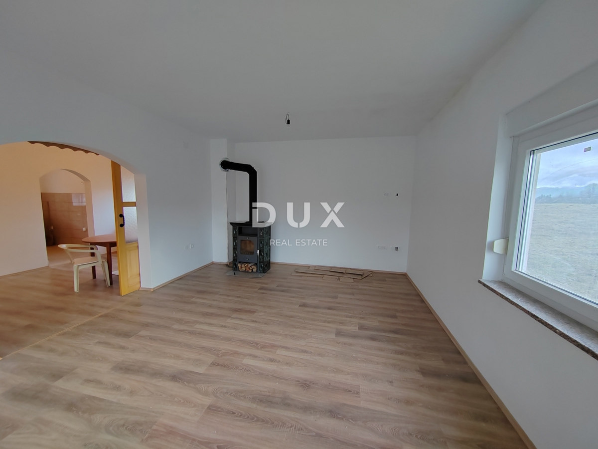 GOSPIĆ - Samostojna hiša s prostornim vrtom in obdelovalnim zemljiščem