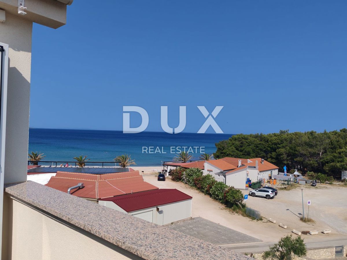  OTOK PAG, POVLJANA - Čudovit apartma v Povljani, en korak od plaže s teraso, ki ponuja spektakularen pogled na morje! 
