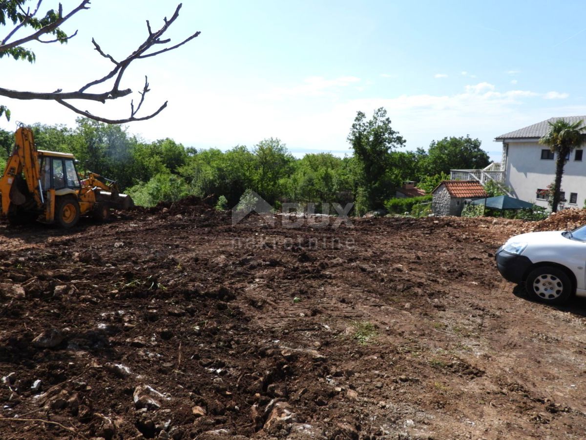 KASTAV, RUBEŠI - gradbeno zemljišče 1957m2 s pogledom na morje za stanovanjsko gradnjo - apartmaji/družinska hiša/vila