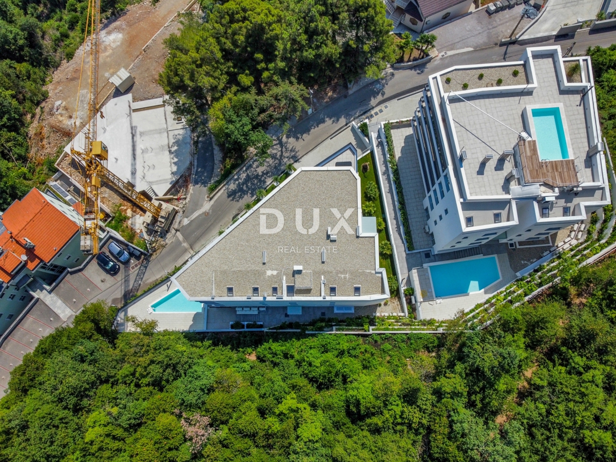 OPATIJA, CENTER - luksuzna stanovanjsko-poslovna stavba s 7 stanovanji, garažo in bazenom v središču Opatije