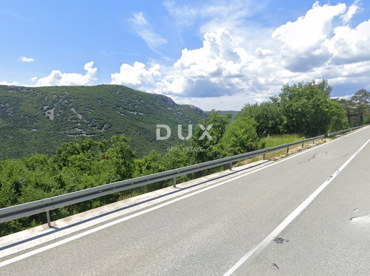 PLOMIN - kmetijsko zemljišče 28000m2 z načrtovano gradnjo 55m2, 300m od morja
