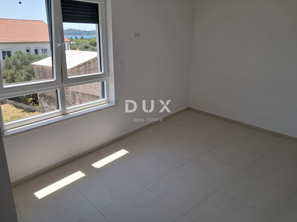 ŠIBENIK, VODICE - Apartma v prvem nadstropju s teraso in 2 parkirnima mestoma