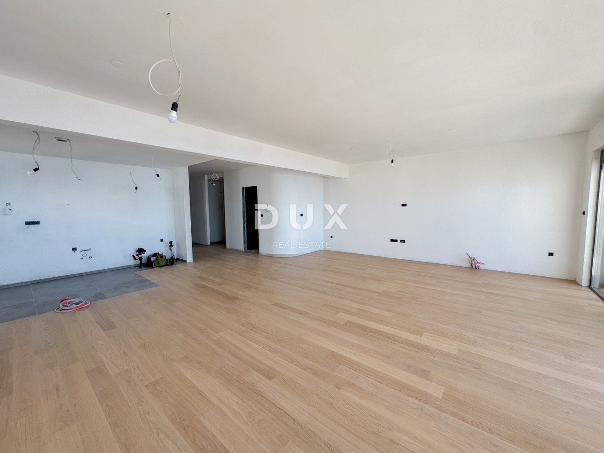 RIJEKA, KANTRIDA - 140m2 veliko stanovanje v luksuzni novogradnji le 250 metrov od morja z garažo in panoramskim pogledom na morje