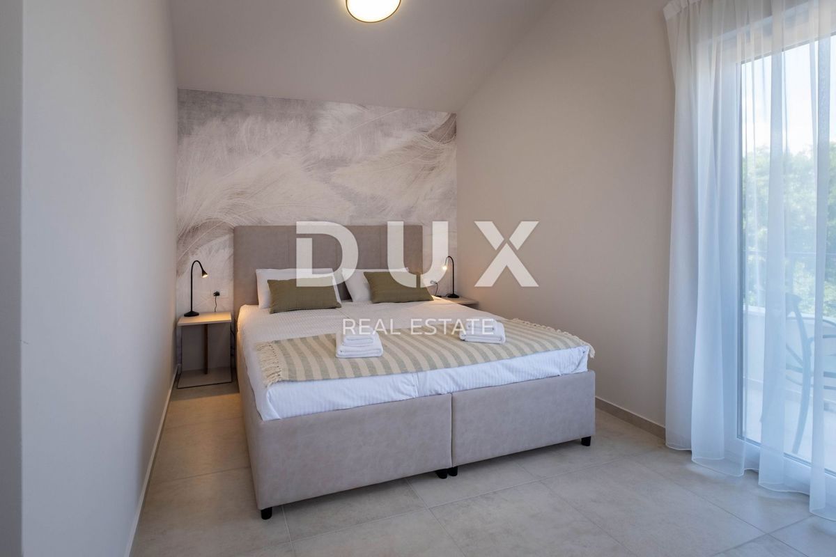 OTOK KRK, okolica mesta Krk - Luksuzna vila v novogradnji na mirni lokaciji