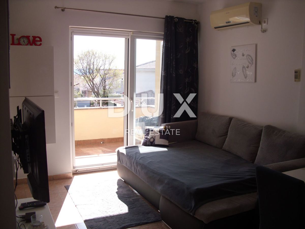 OTOK KRK, MESTO KRK - Apartma 2 spalnici + dnevna soba z vrtom 53 m2