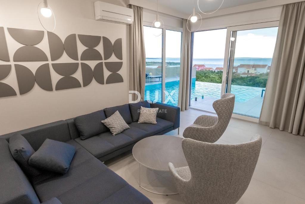 OTOK PAG, NOVALJA - Odlična naložba: luksuzna vila z bazenom in pogledom na morje