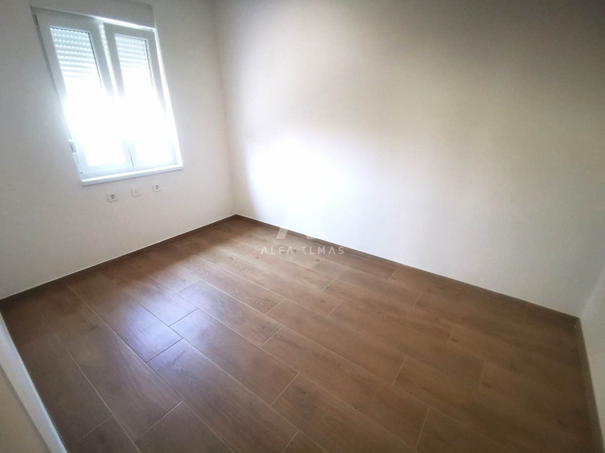Two-bedroom ground floor apartment with a yard near the sea in Šilo - ID 503