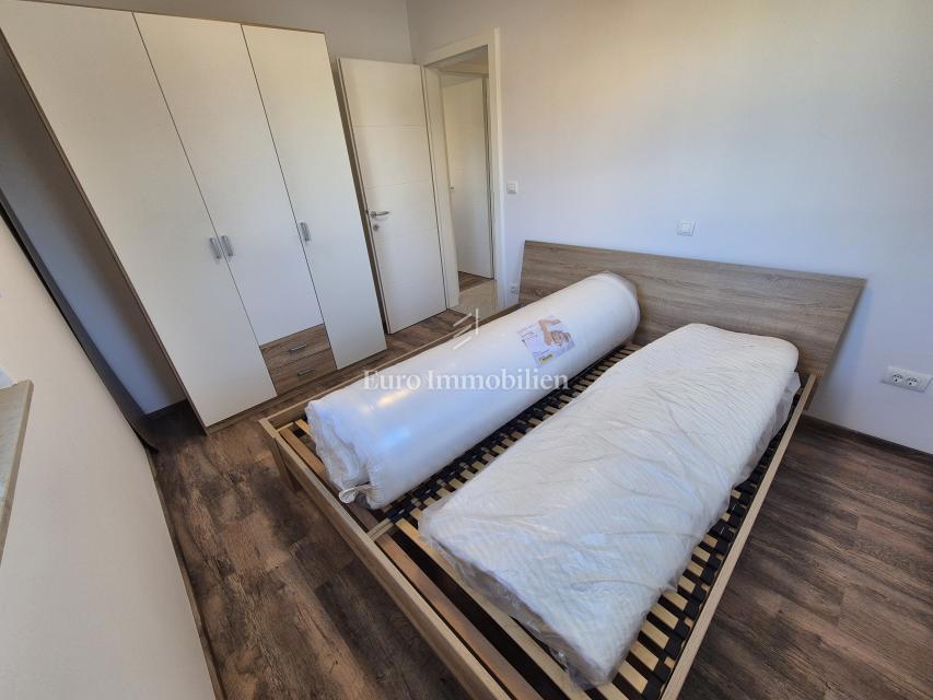 Malinska - apartma z vrtom 100 m od morja