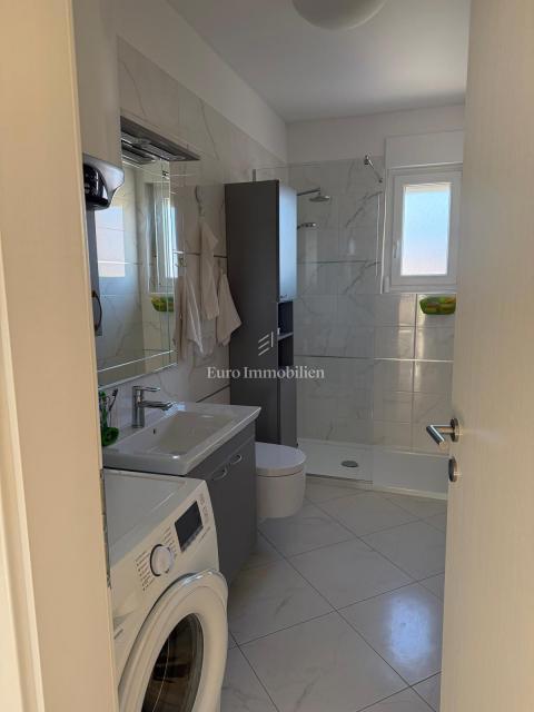 Dvosobno stanovanje v novejši stavbi v Buzdohanju