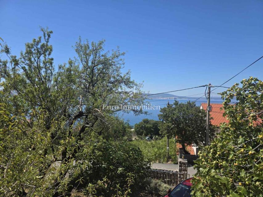 Novi Vinodolski, Smokvica Krmpotska, hiša z dvema apartmajema