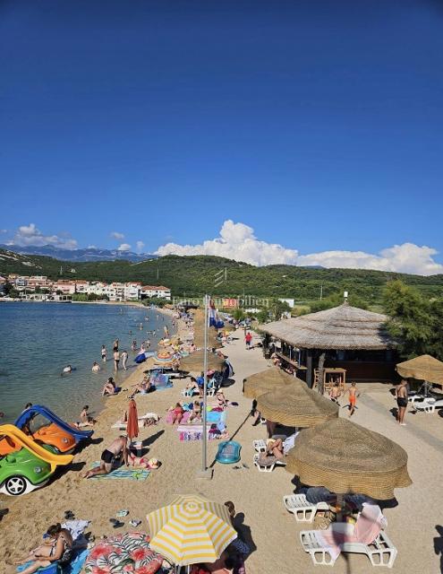 Stanovanje v novogradnji z vrtom, blizu morja