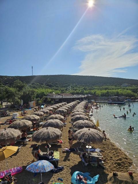 Stanovanje v novogradnji z vrtom, blizu morja