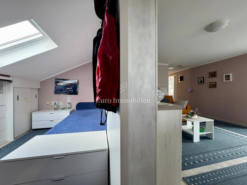 Labin – stanovanje z vrtom in garažo