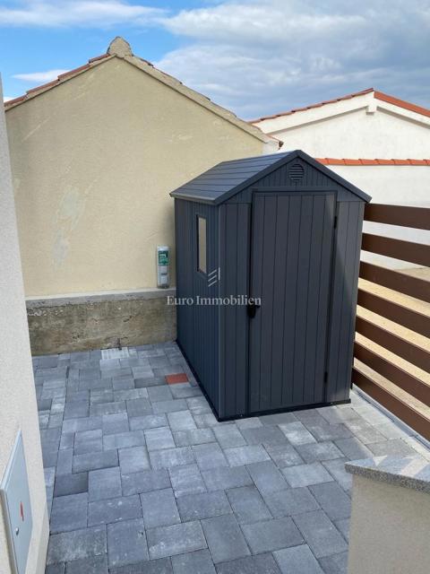 Tisno - Apartma z vrtom in pogledom na morje