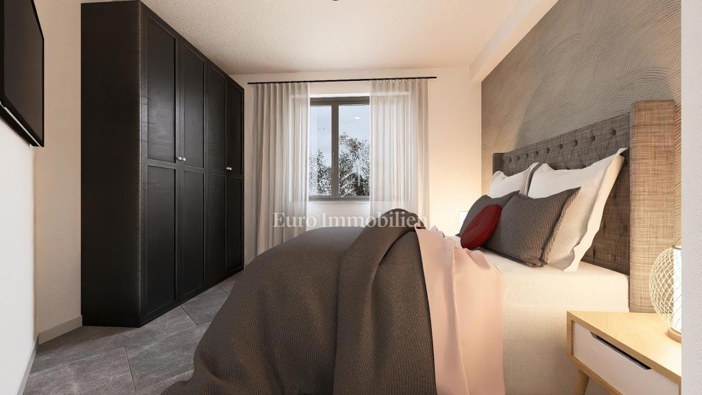 Apartma v novogradnji s pogledom na morje