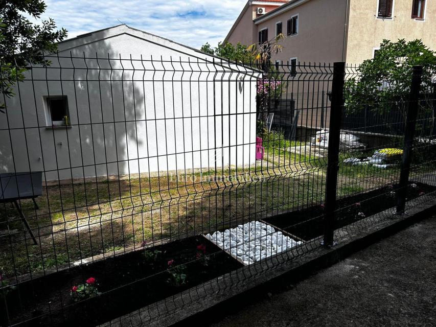 Samostojna pritlična hiša z vrtom