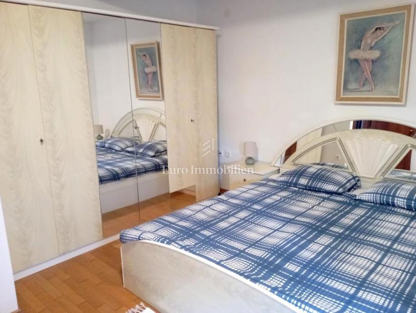 Pritlično stanovanje z vrtom