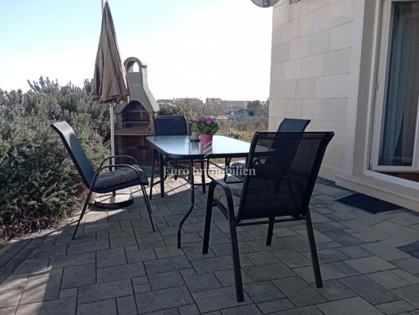 Pritlično stanovanje z vrtom