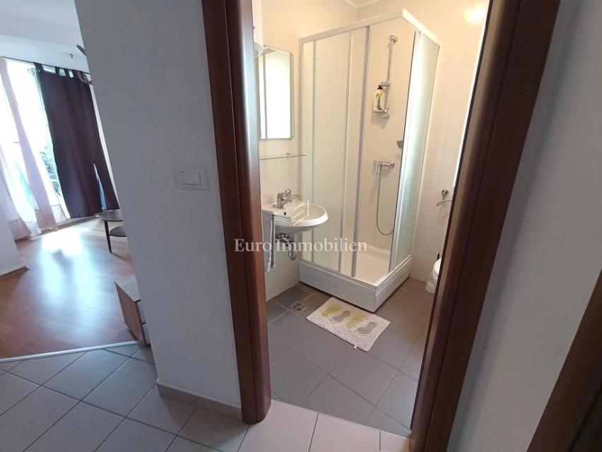 Pritlično stanovanje z vrtom