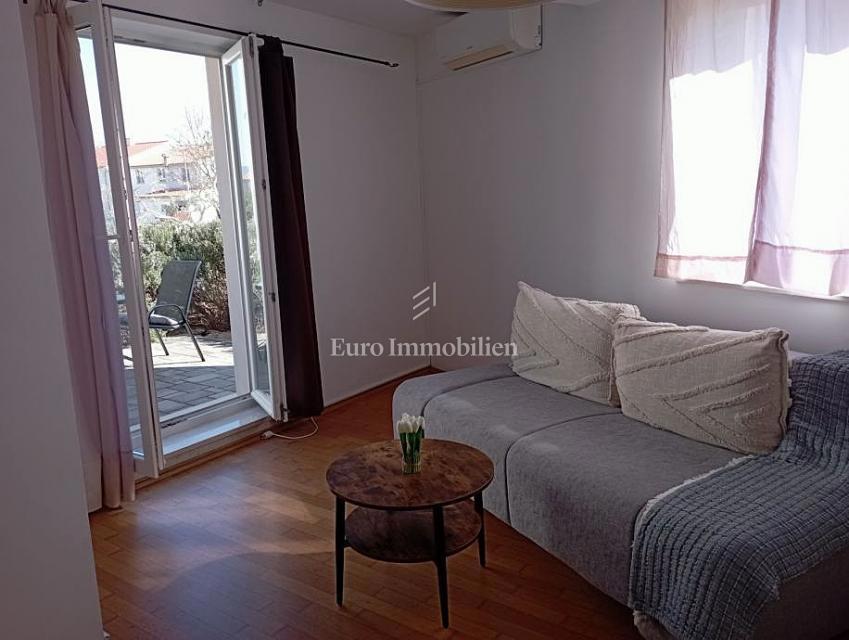 Pritlično stanovanje z vrtom