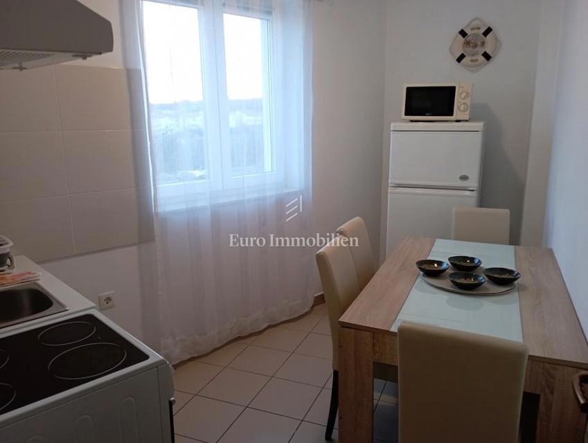 Pritlično stanovanje z vrtom