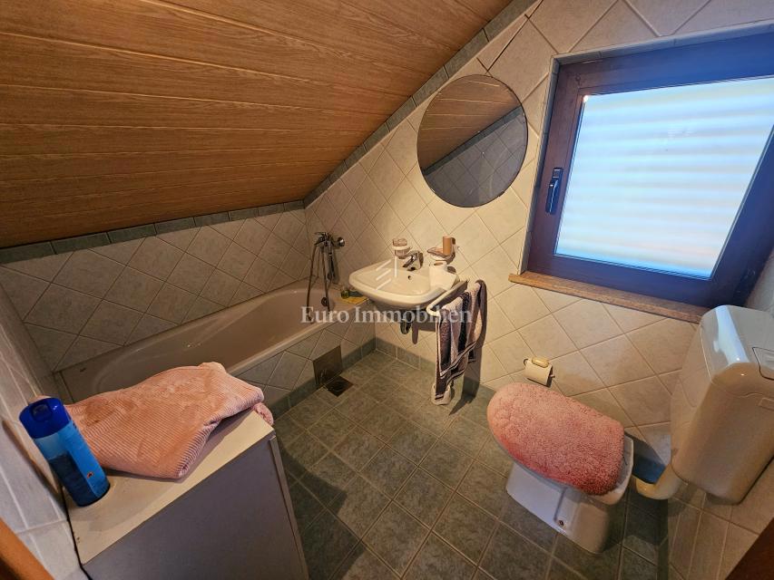 Prostoren apartma s 4 spalnicami v Malinski