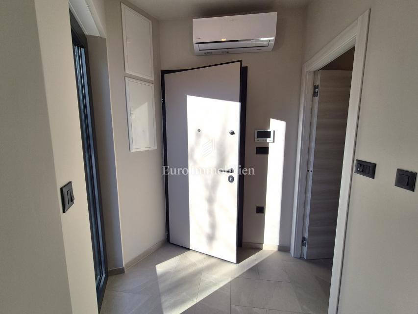 Stanovanje v pritličju novogradnje z vrtom