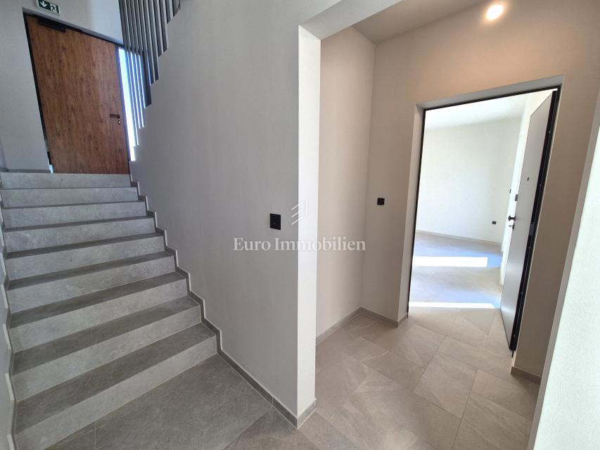 Stanovanje v pritličju novogradnje z vrtom