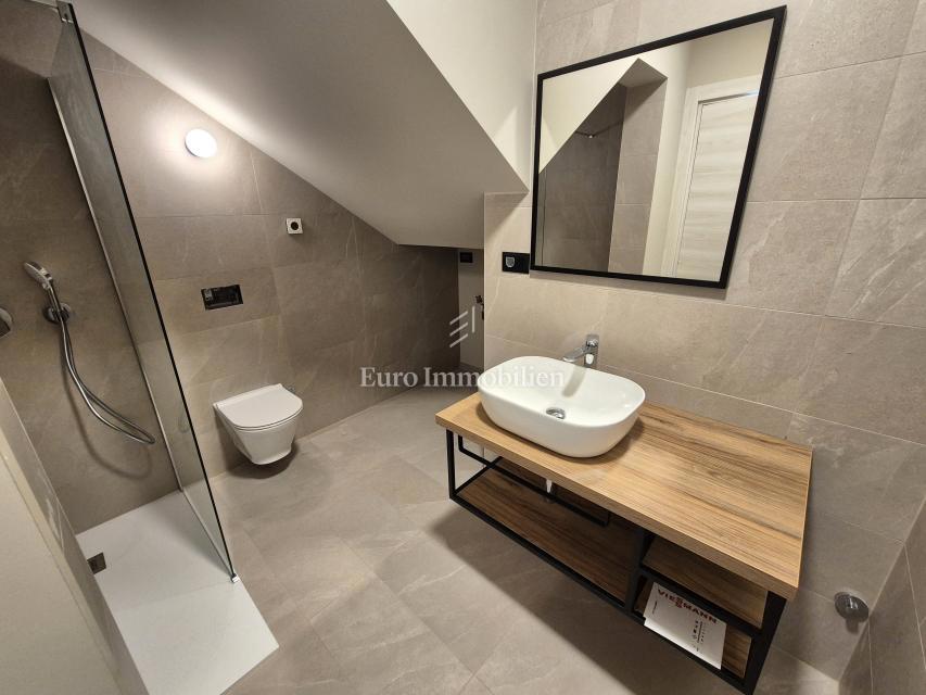 Stanovanje v pritličju novogradnje z vrtom