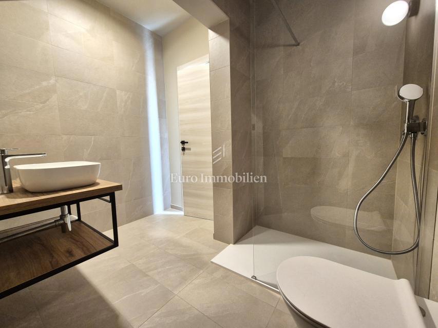 Stanovanje v pritličju novogradnje z vrtom