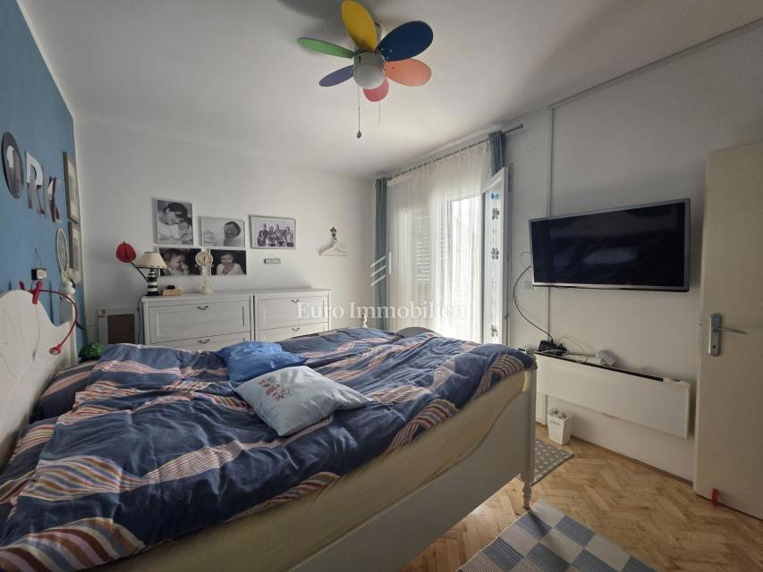 Stanovanje z dvoriščem in garažo na odlični lokaciji