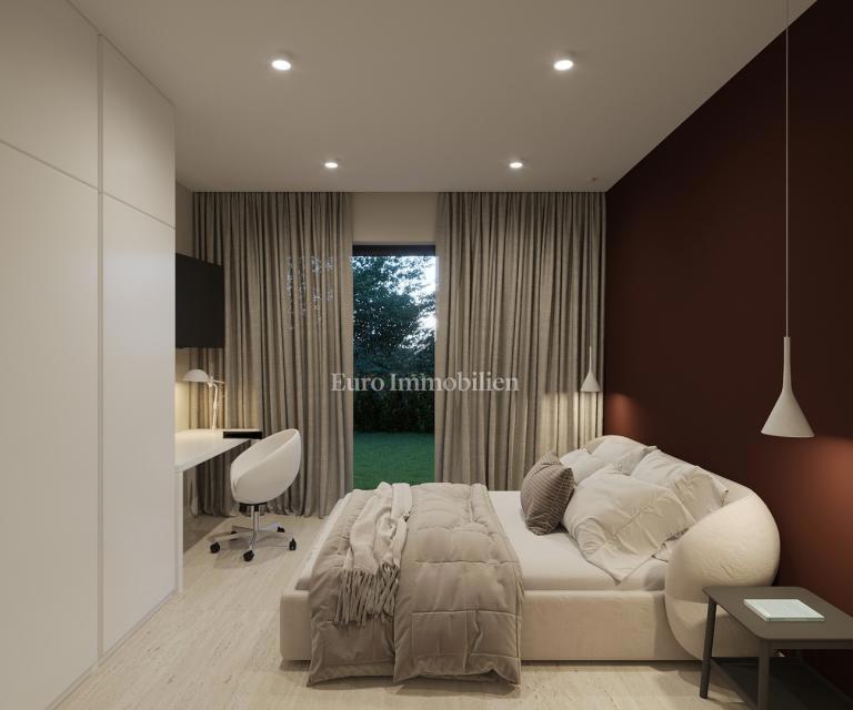 Peroj, novogradnja – stanovanje v pritličju z vrtom