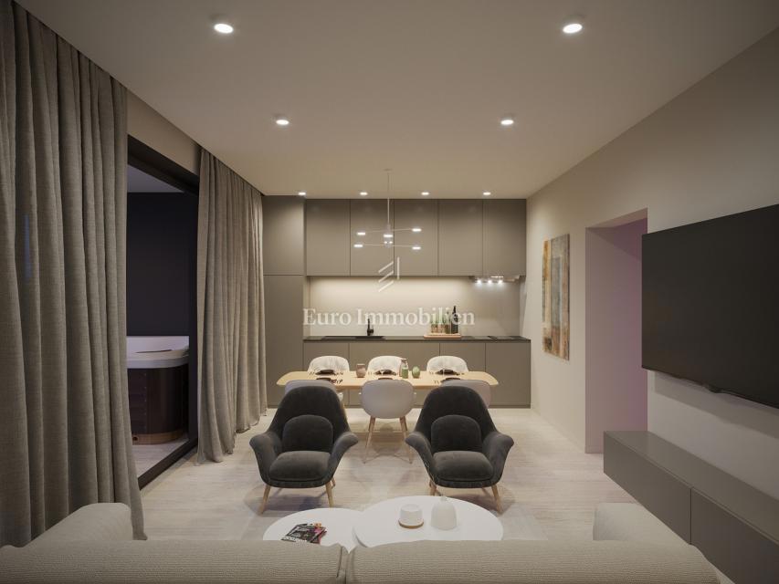 Peroj, novogradnja – stanovanje v pritličju z vrtom