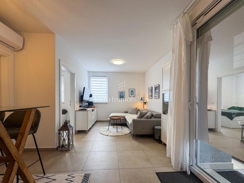 Stanovanje v Pritličju s Prostorno Teraso in Vrtom